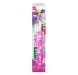 Brosse à dents en plastique souple avec poils doux de couleur rose. GUM Junior